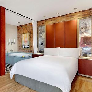 Kamer met een Queen Size Bed